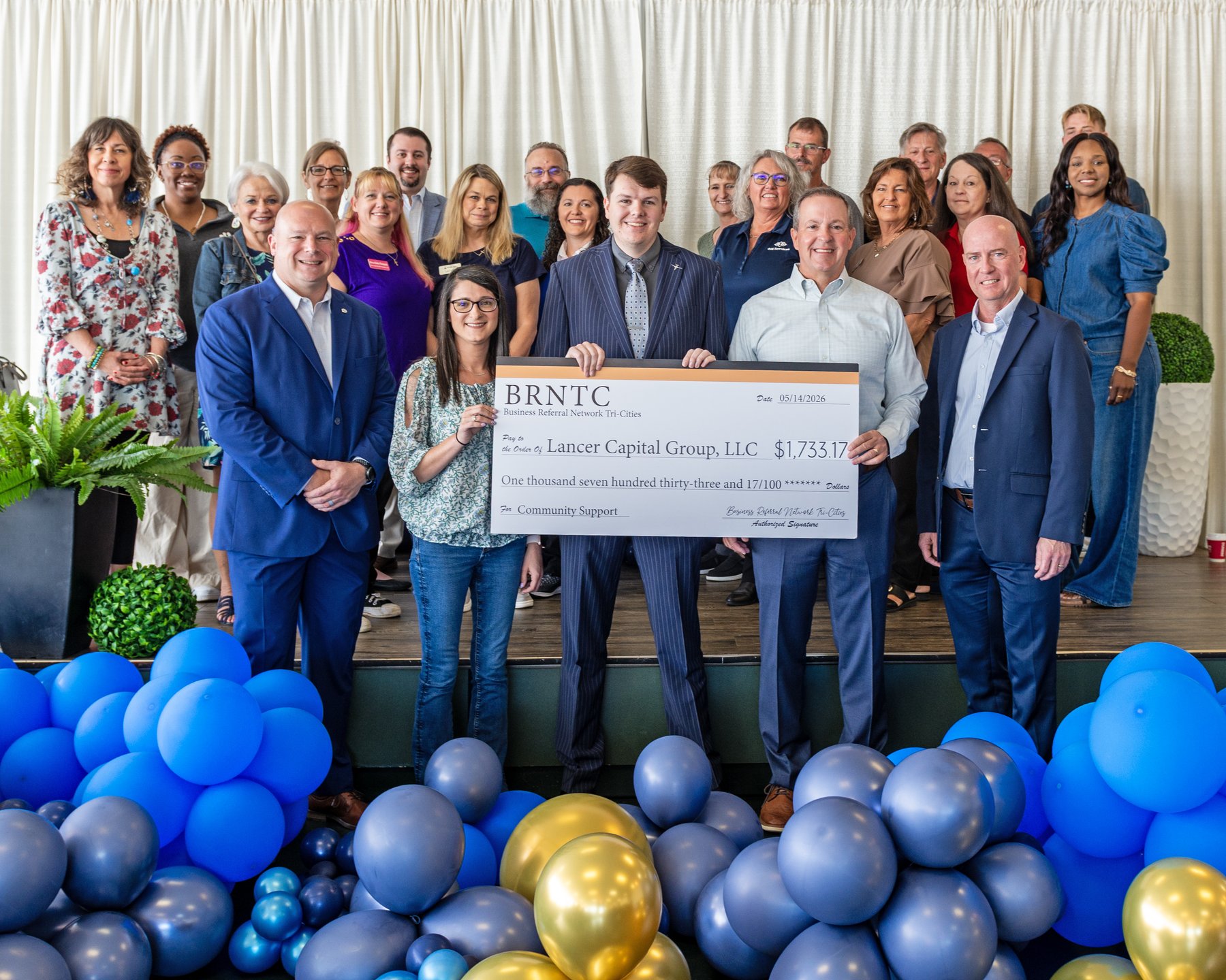 BRNTC presents $1,733.17 check to Lancer Capital Group, LLC — 2nd year giveback